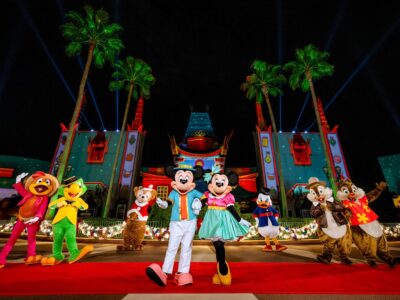 Disney characters in holiday costumes at Disney Jollywood Nights event at Hollywood Studios
